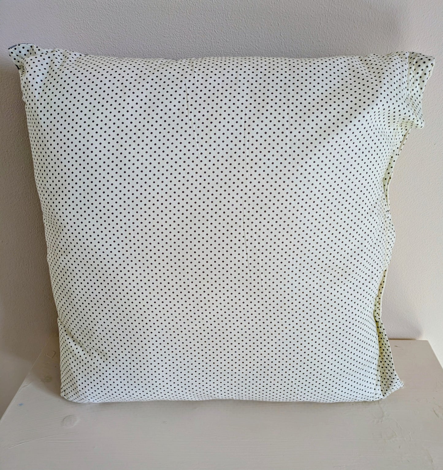 Grey patchwork cushion by Harrie's Crafts featuring a cozy, multi-textured fabric design for home decor.