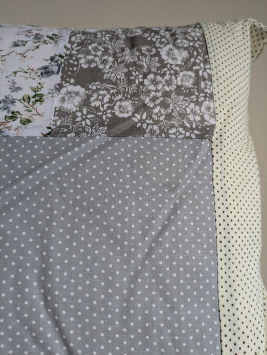 Grey patchwork cushion