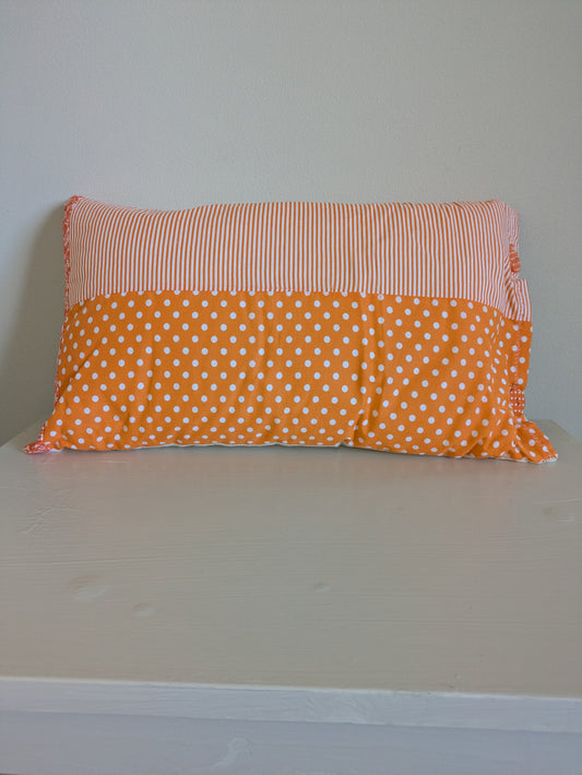 Orange patchwork cushion