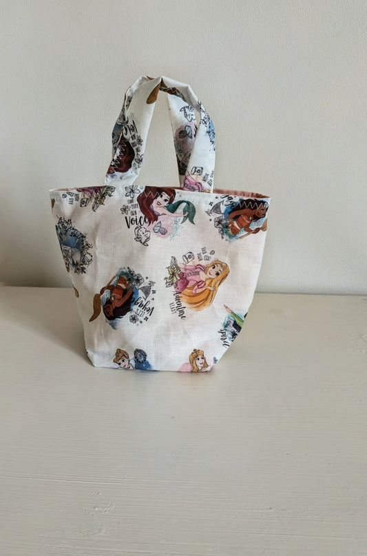 Harrie's Crafts Princess tote bag with colorful floral design and sturdy handles, ideal for carrying daily essentials.