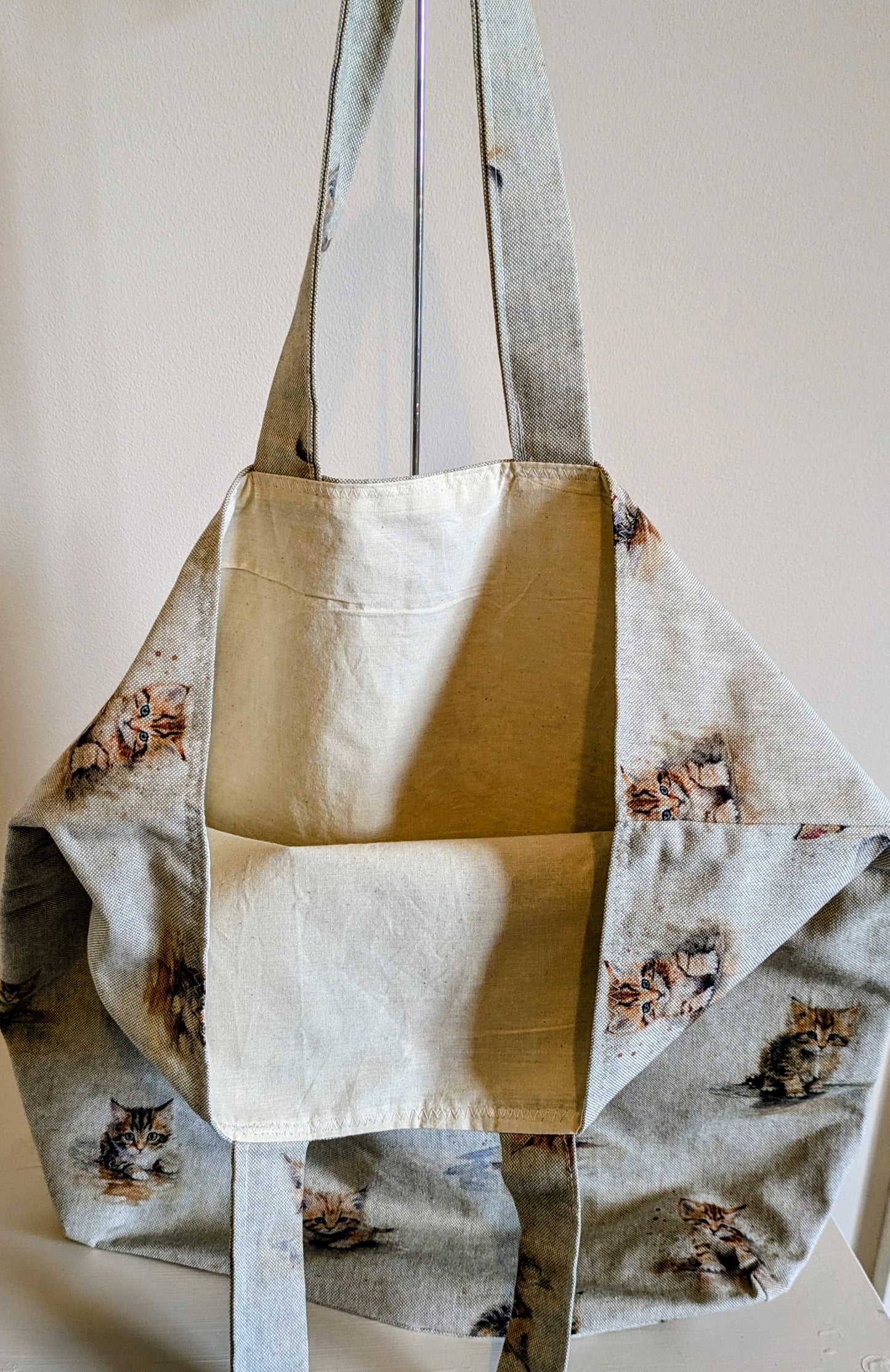 Harrie's Crafts kitten tote bag featuring a cute illustrated kitten design on durable fabric, perfect for carrying essentials.