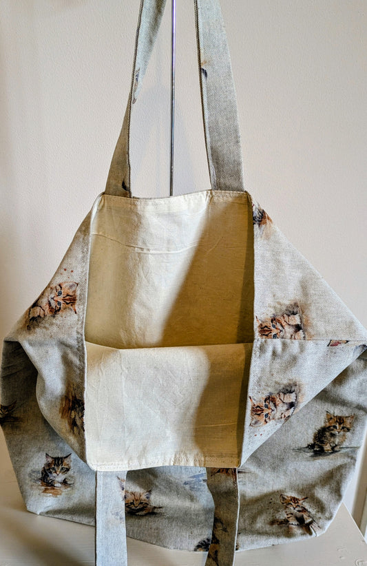 Harrie's Crafts kitten tote bag featuring a cute illustrated kitten design on durable fabric, perfect for carrying essentials.