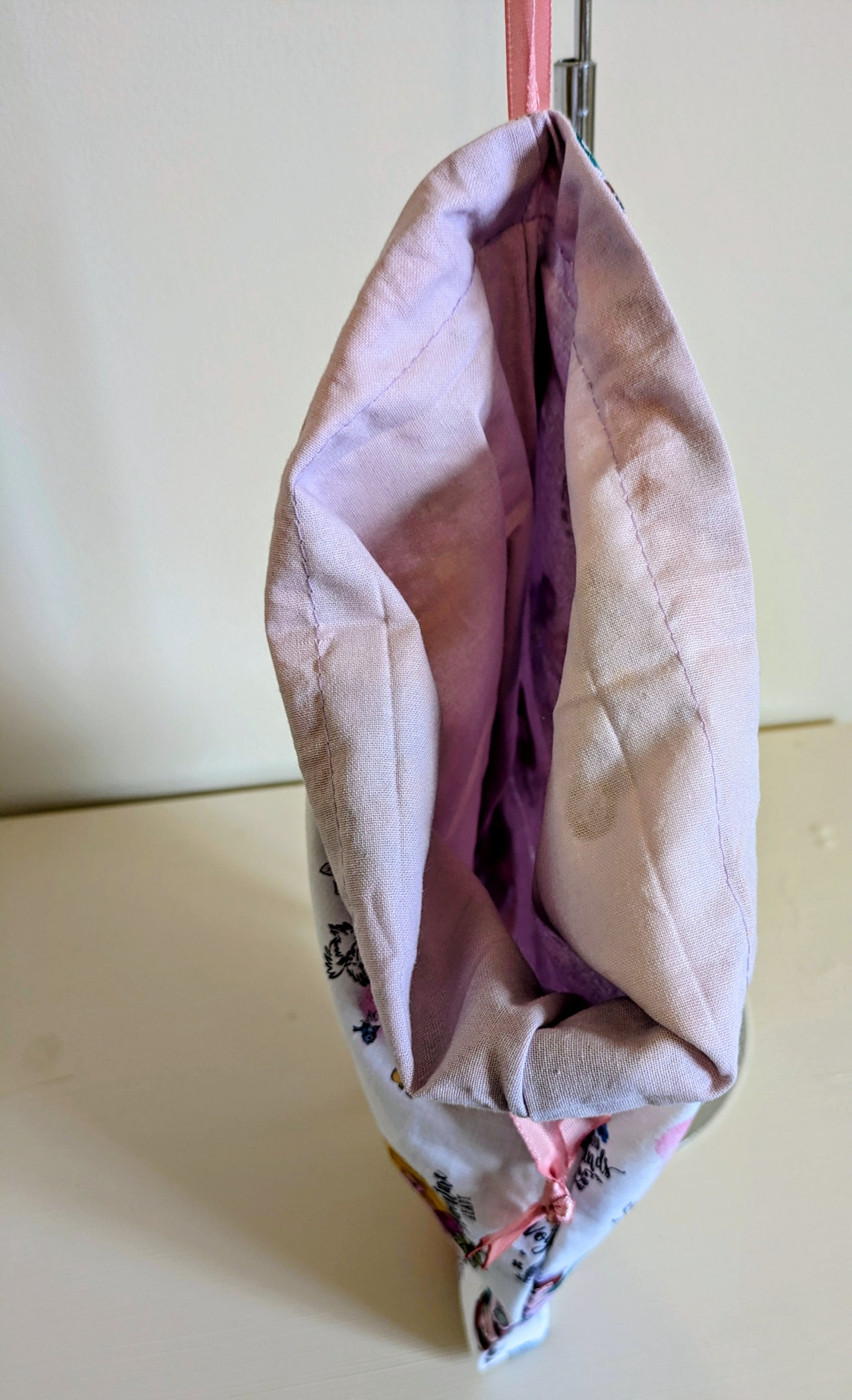Harrie's Crafts princess drawstring bag with colorful princess design and adjustable black drawstrings on a white background.