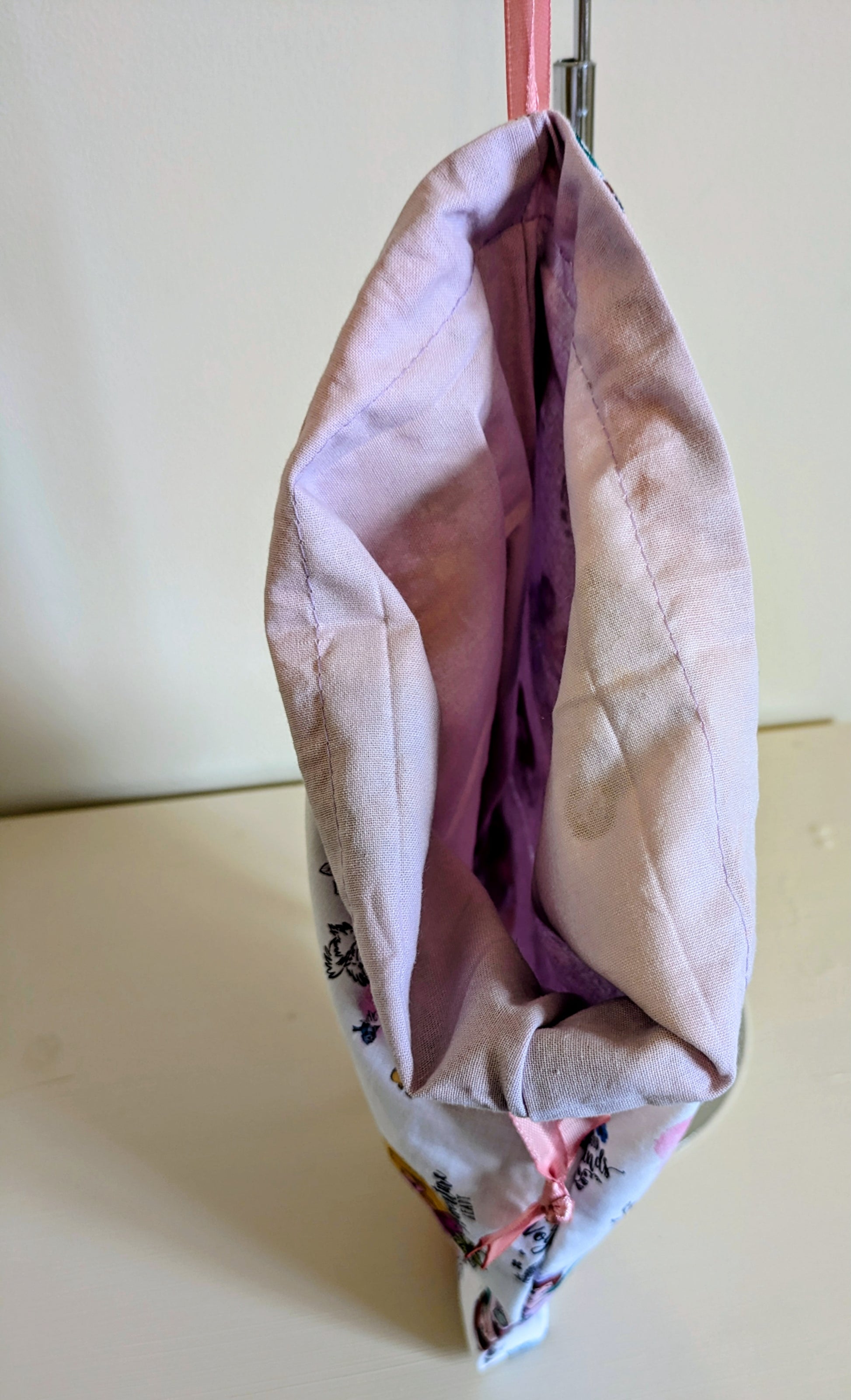 Harrie's Crafts princess drawstring bag with colorful princess design and adjustable black drawstrings on a white background.