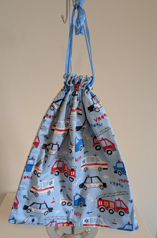 Harrie's Crafts transport drawstring bag in durable fabric with black drawstrings, ideal for carrying essentials.