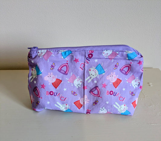 Peppa Pig wash bag by Harrie's Crafts featuring a colorful Peppa Pig design on a soft fabric bag.