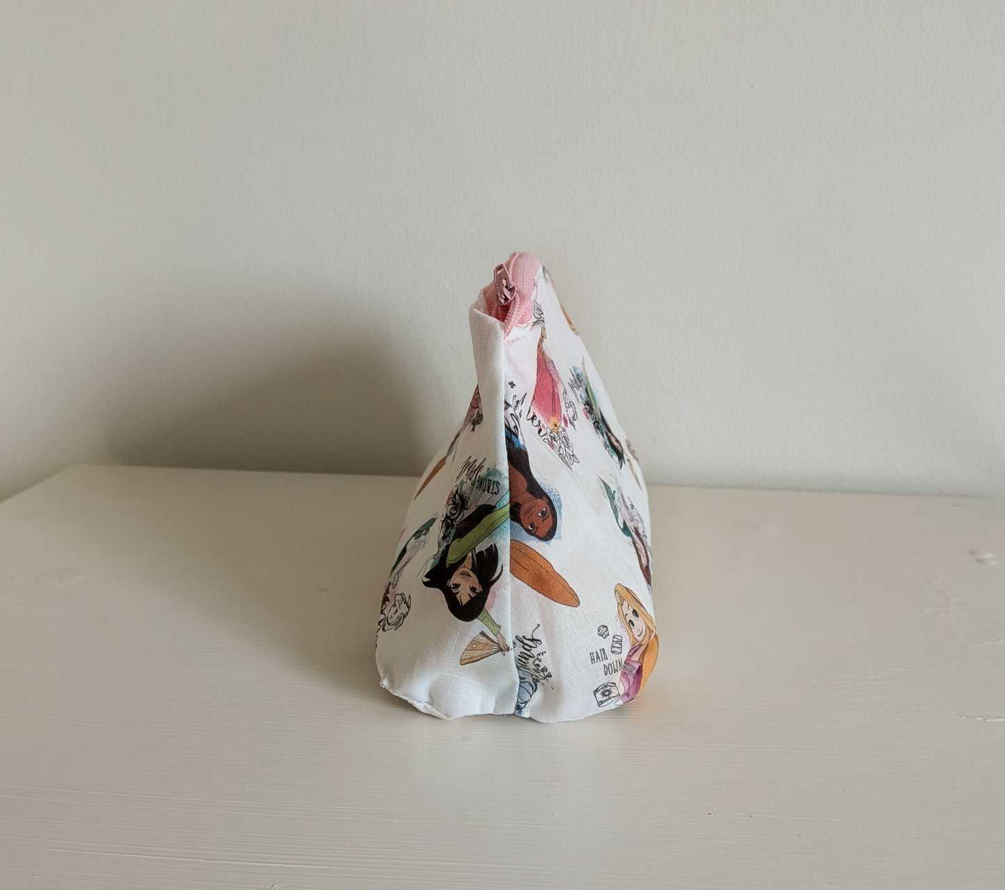 Harrie's Crafts princess wash bag with colorful floral pattern, zipper closure, and compact design for travel or daily use.