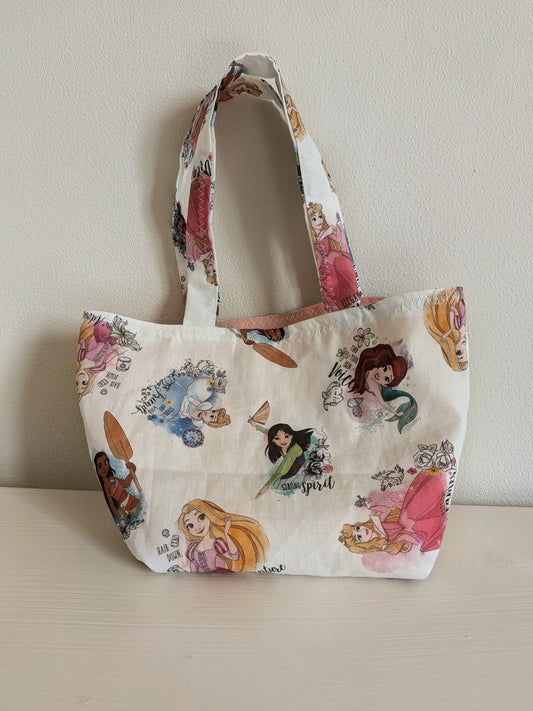 Harrie's Crafts Princess tote bag featuring colorful illustrations and sturdy handles, perfect for carrying daily essentials.