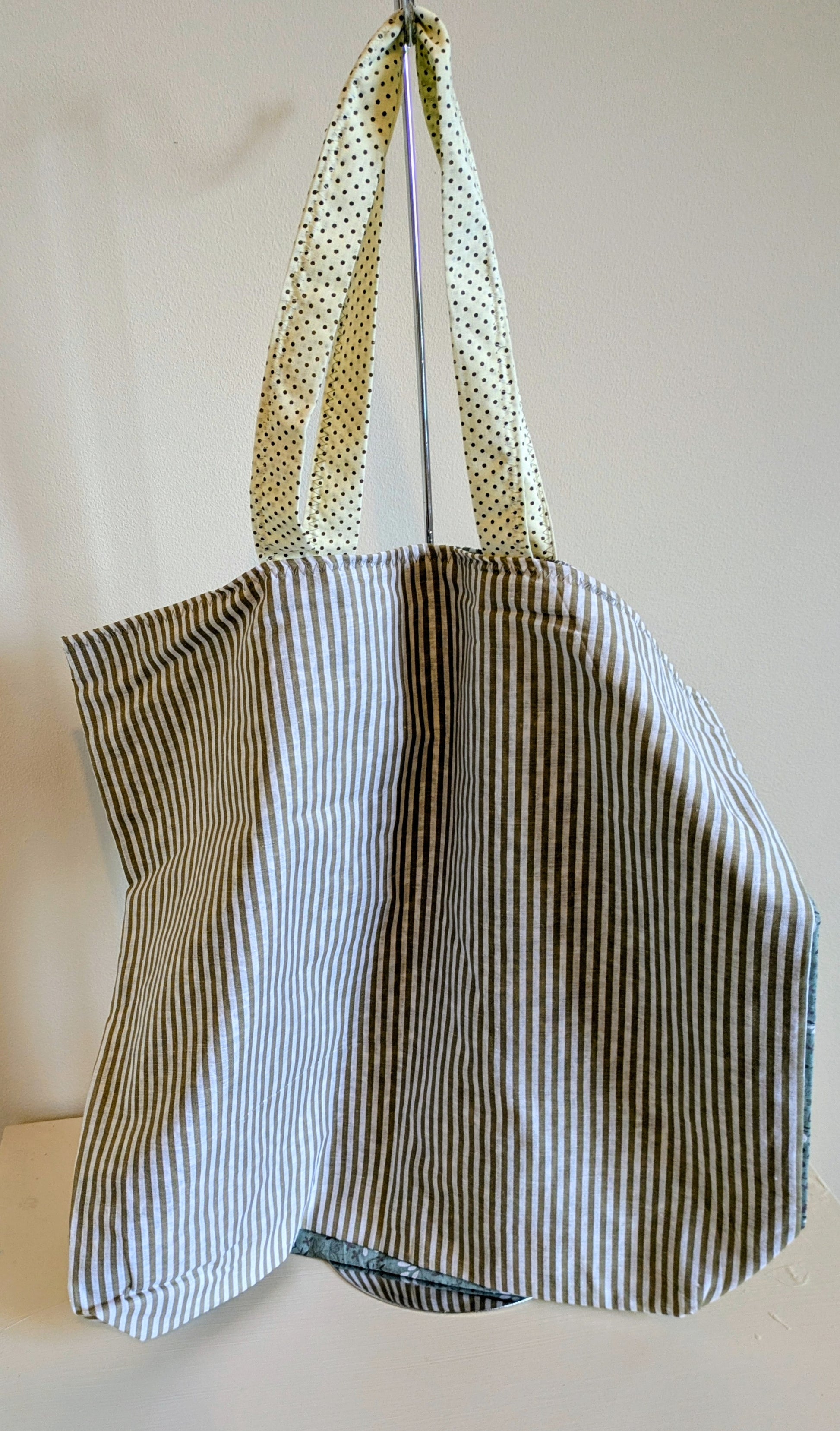 Green tote bag by Harrie's Crafts featuring sturdy handles and spacious interior, perfect for everyday use.