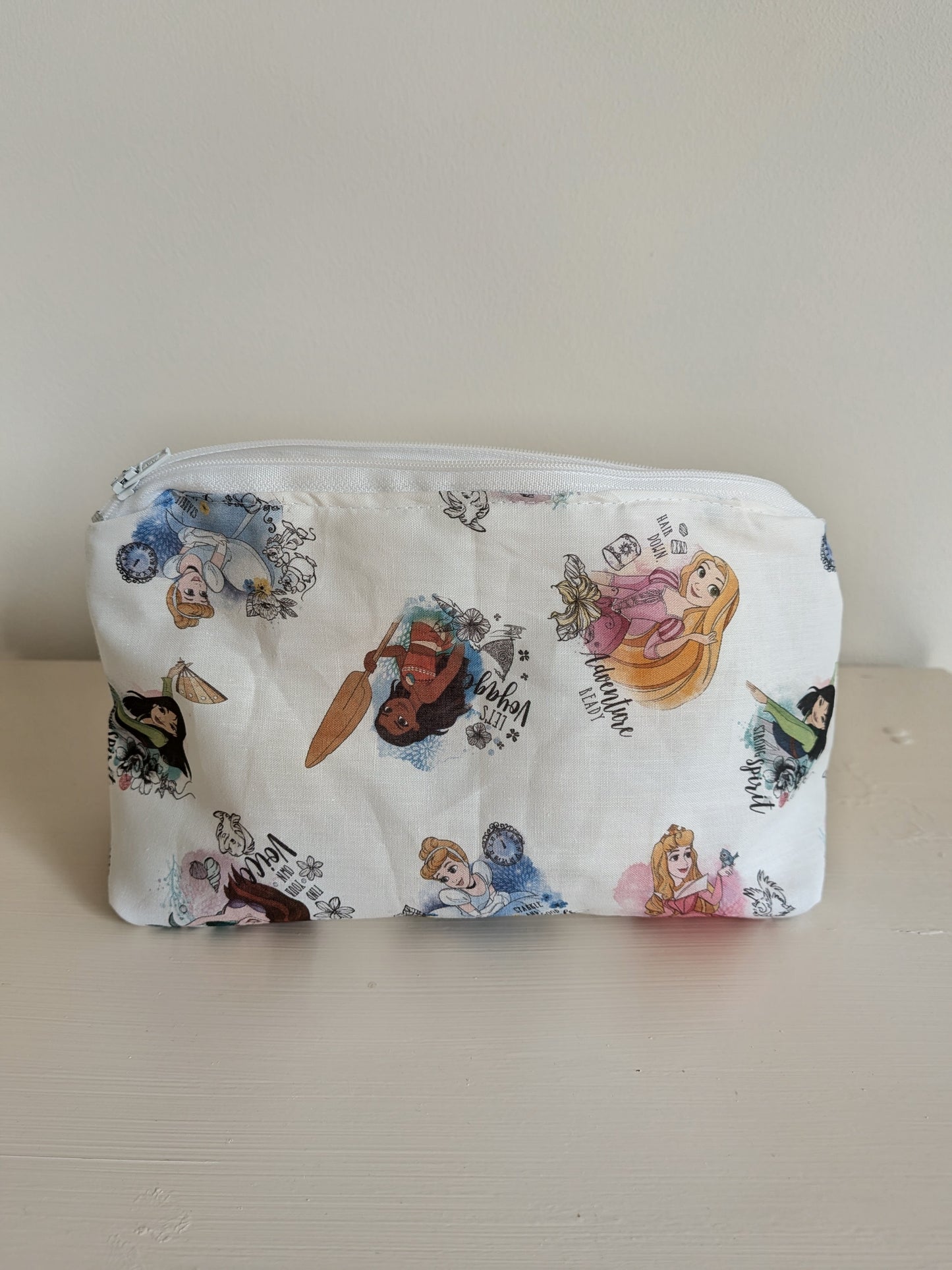 Harrie's Crafts Princess wash bag with waterproof lining, featuring a colorful princess design and zipper closure for travel and storage.