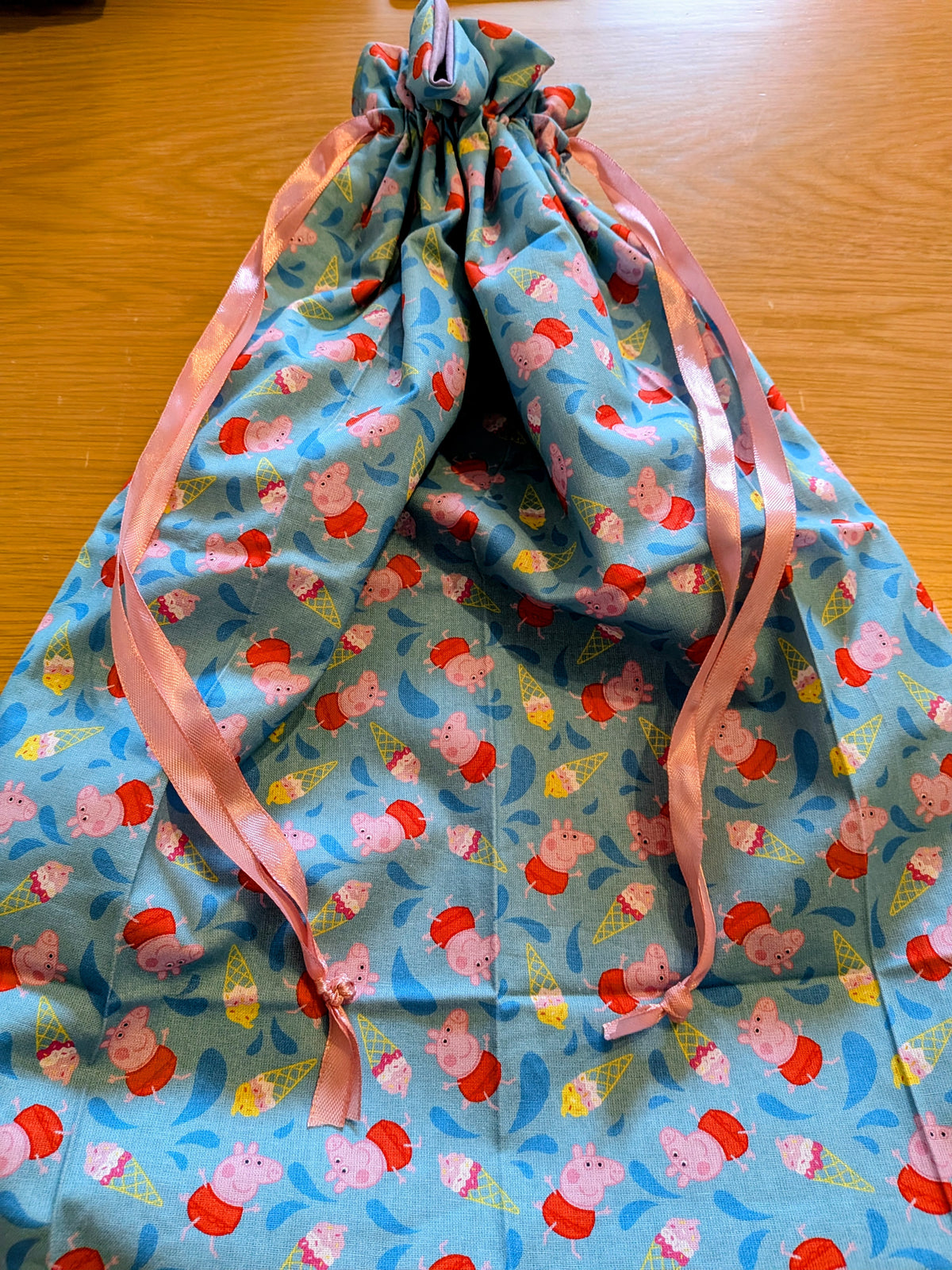 Peppa Pig Drawstring Bag – Purple Lining & Pink Ribbon